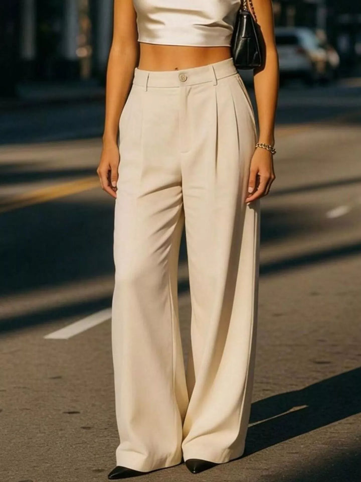 Pleated high-rise wide-leg trousers with side pockets