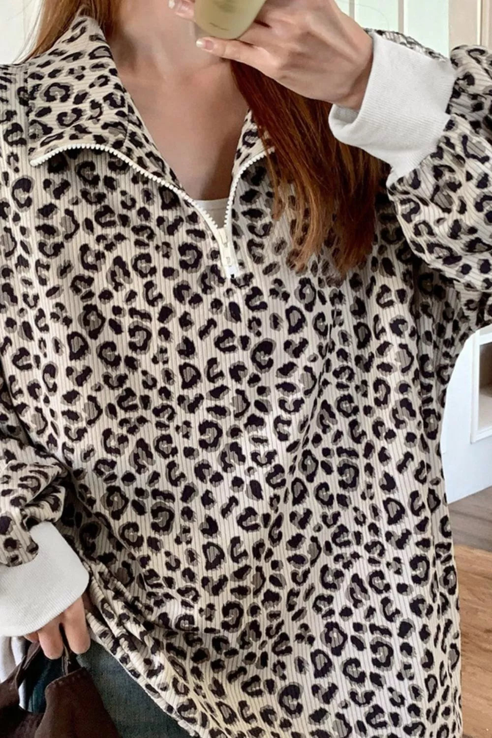 Leopard print ribbed quarter-zip pullover sweatshirt