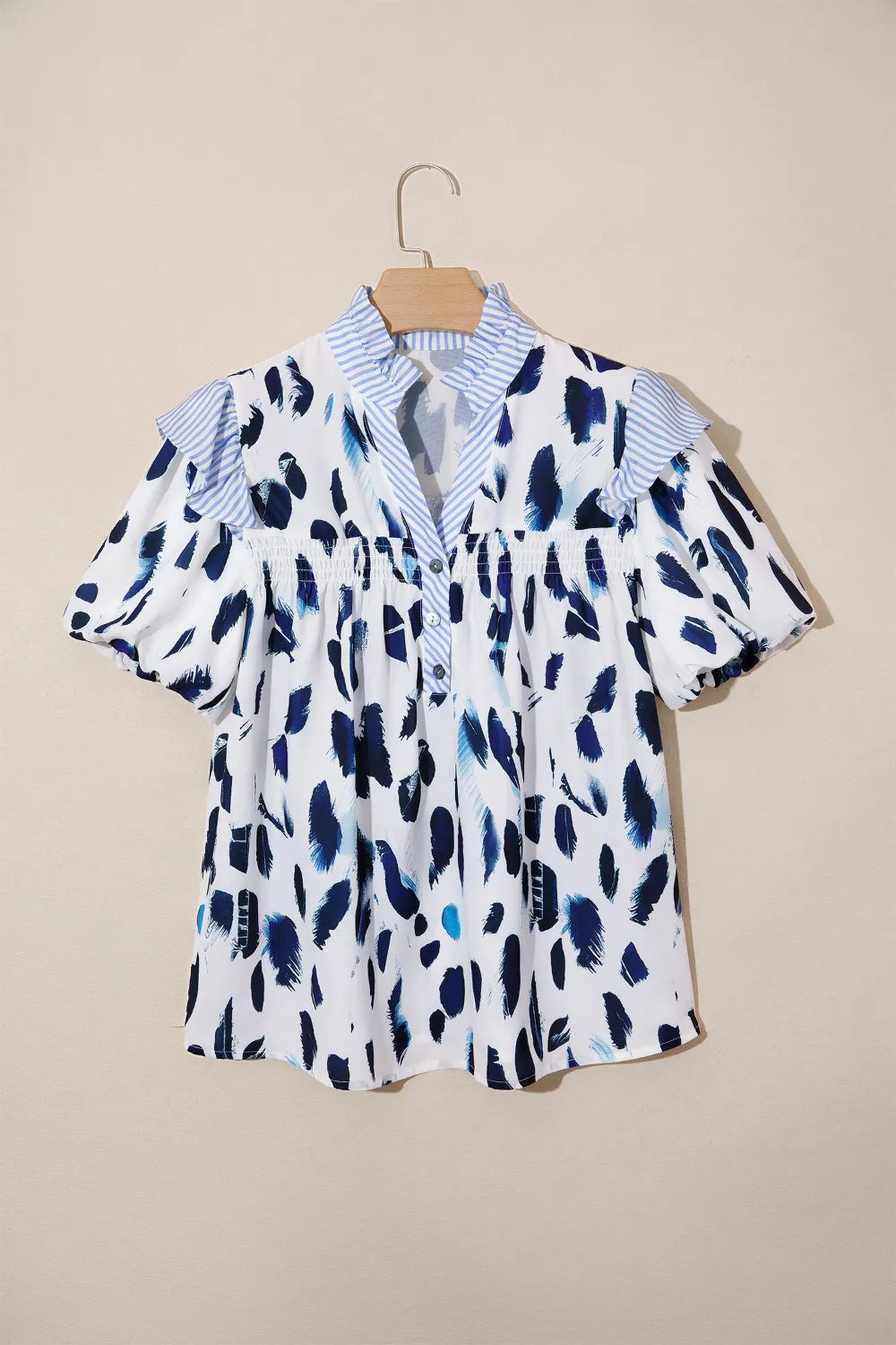 Abstract animal print blouse with striped ruffle yoke