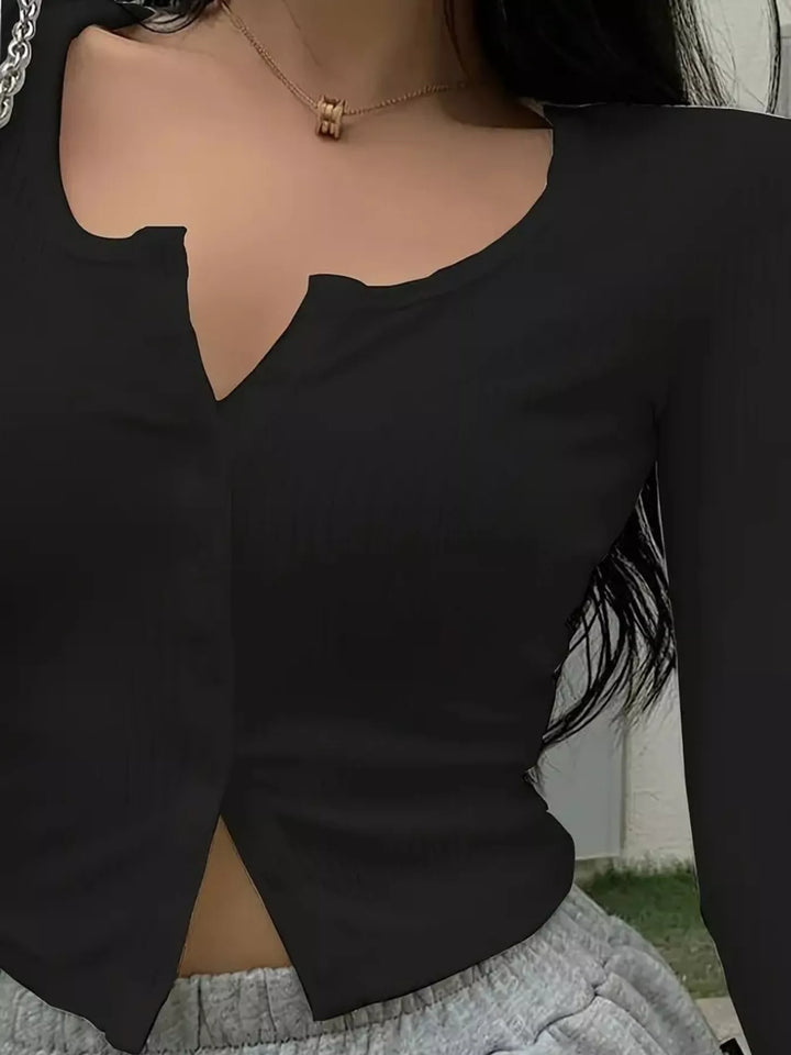 Ribbed knit button-front long sleeve top