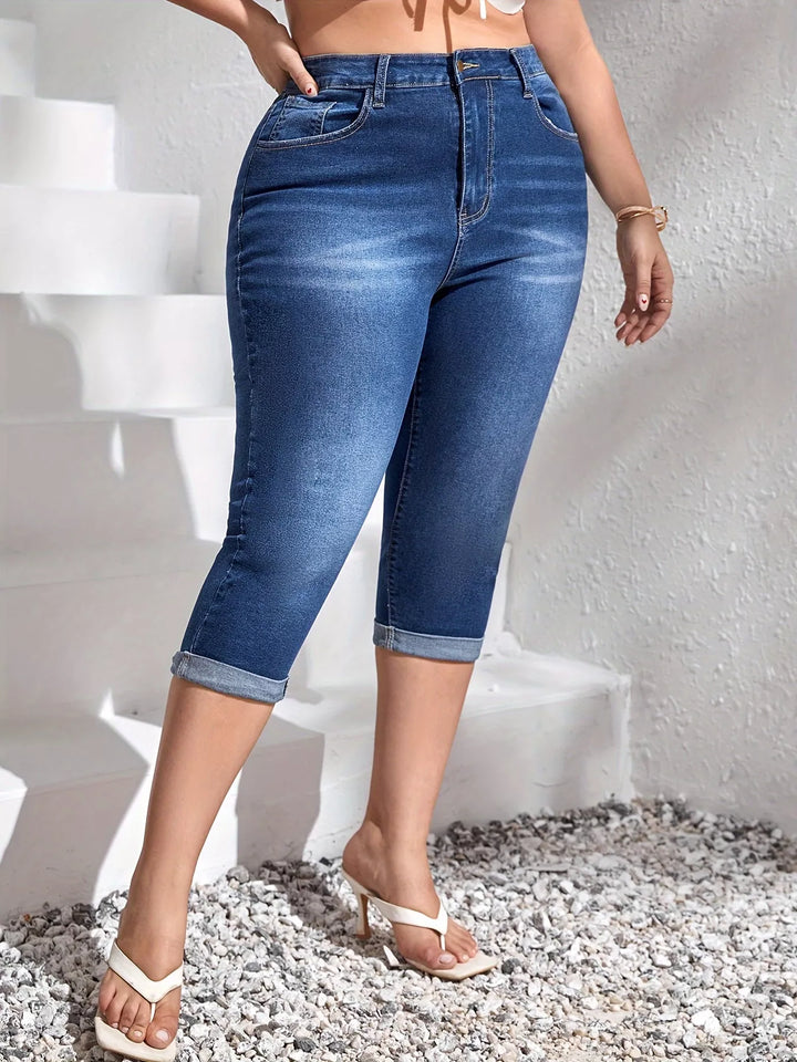 High-rise rolled hem capri jeans in plus size denim