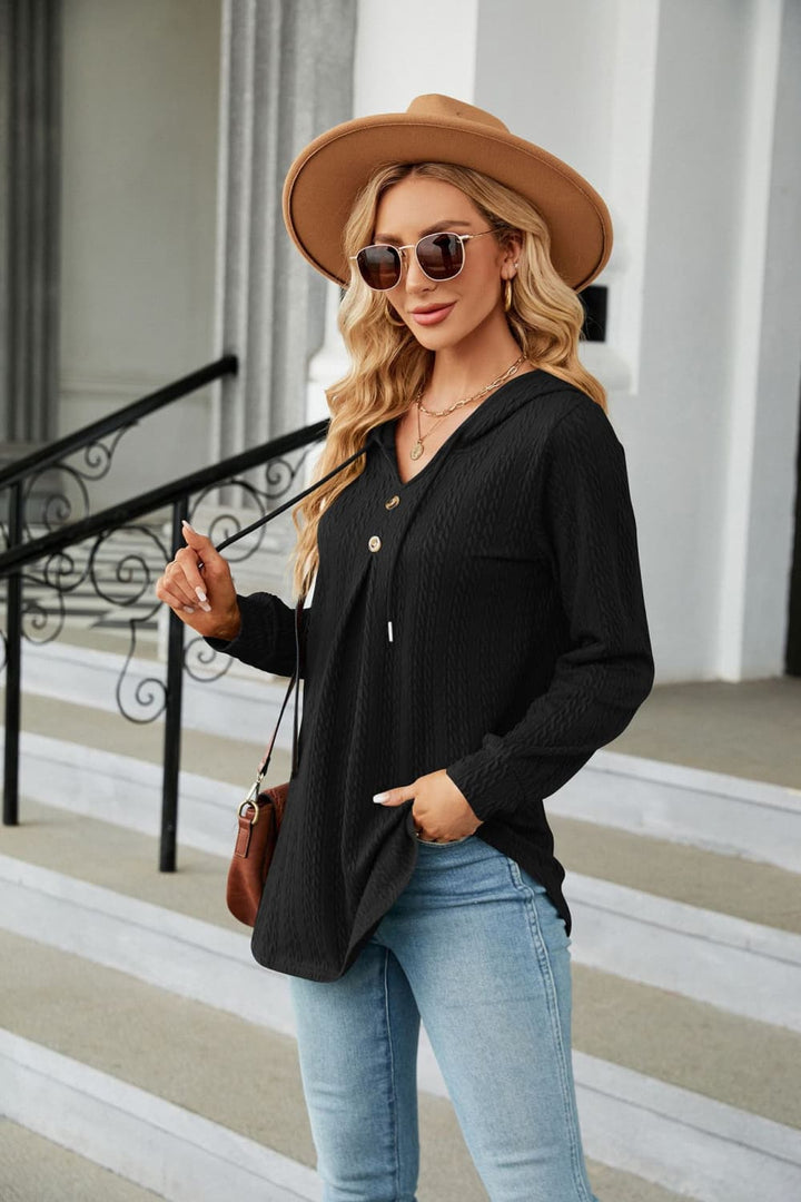 Cable knit hooded top with tie neck and button placket
