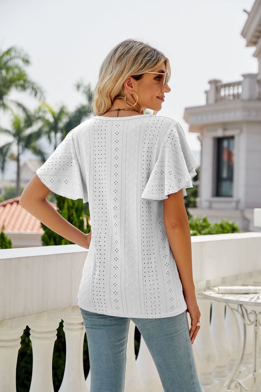 Eyelet knit flutter sleeve round neck top