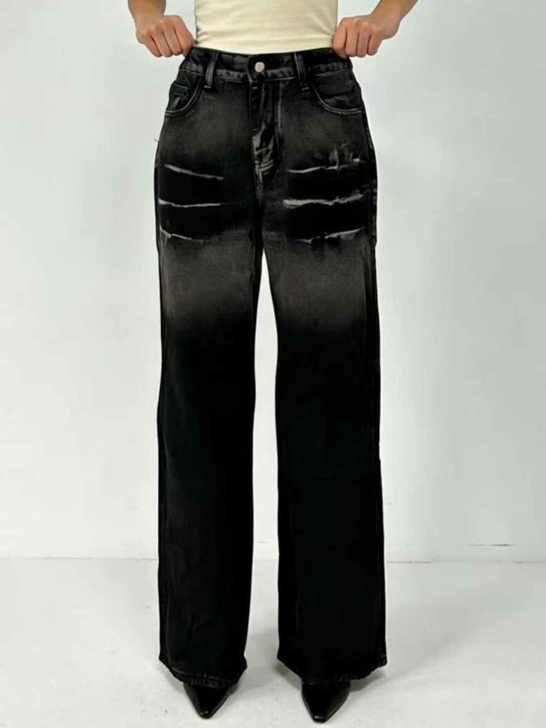 Distressed wide-leg jeans with faded thigh wash