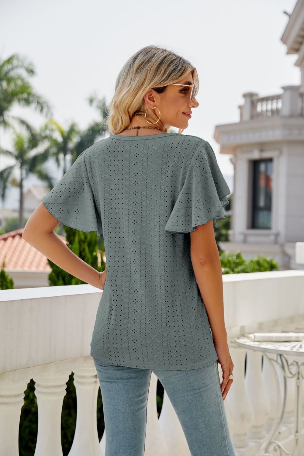 Eyelet knit flutter sleeve round neck top