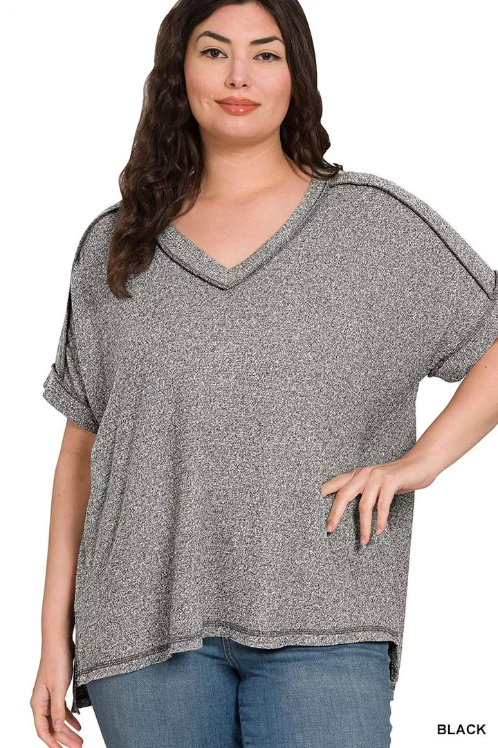 Melange hacci V-neck tee with exposed seams and hi-low hem