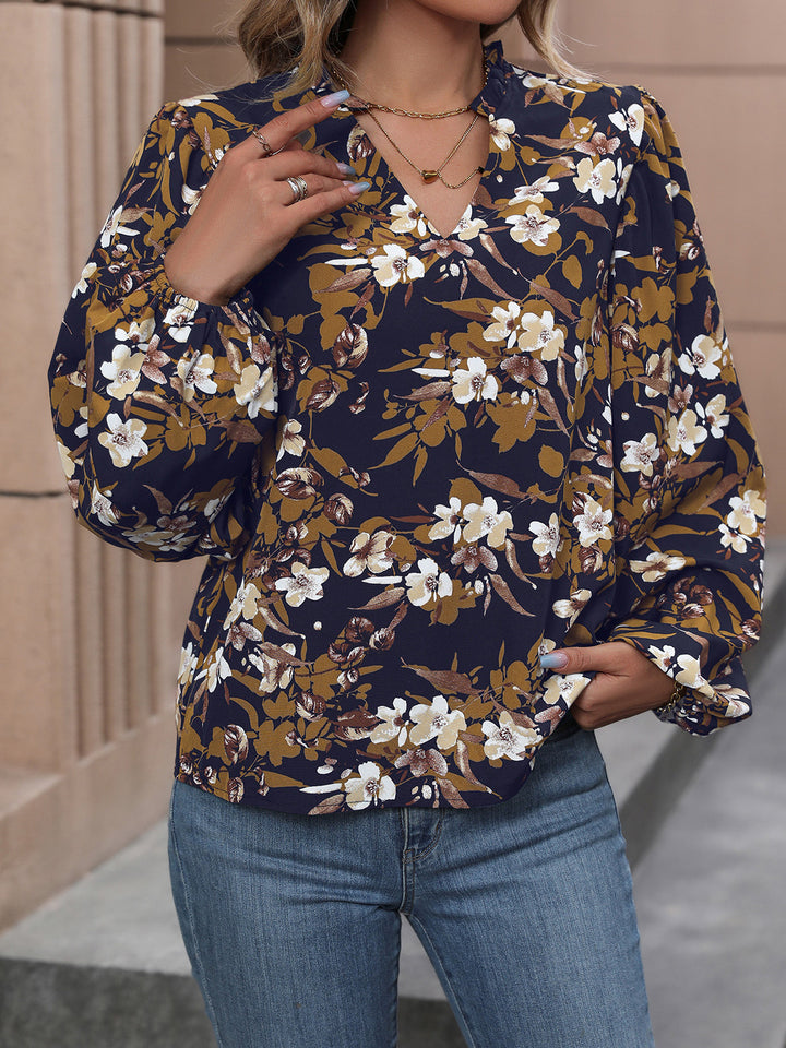 Navy Floral balloon sleeve blouse with notched V-neck