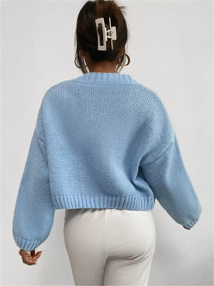 Cropped cloud-print button-up V-neck knit cardigan