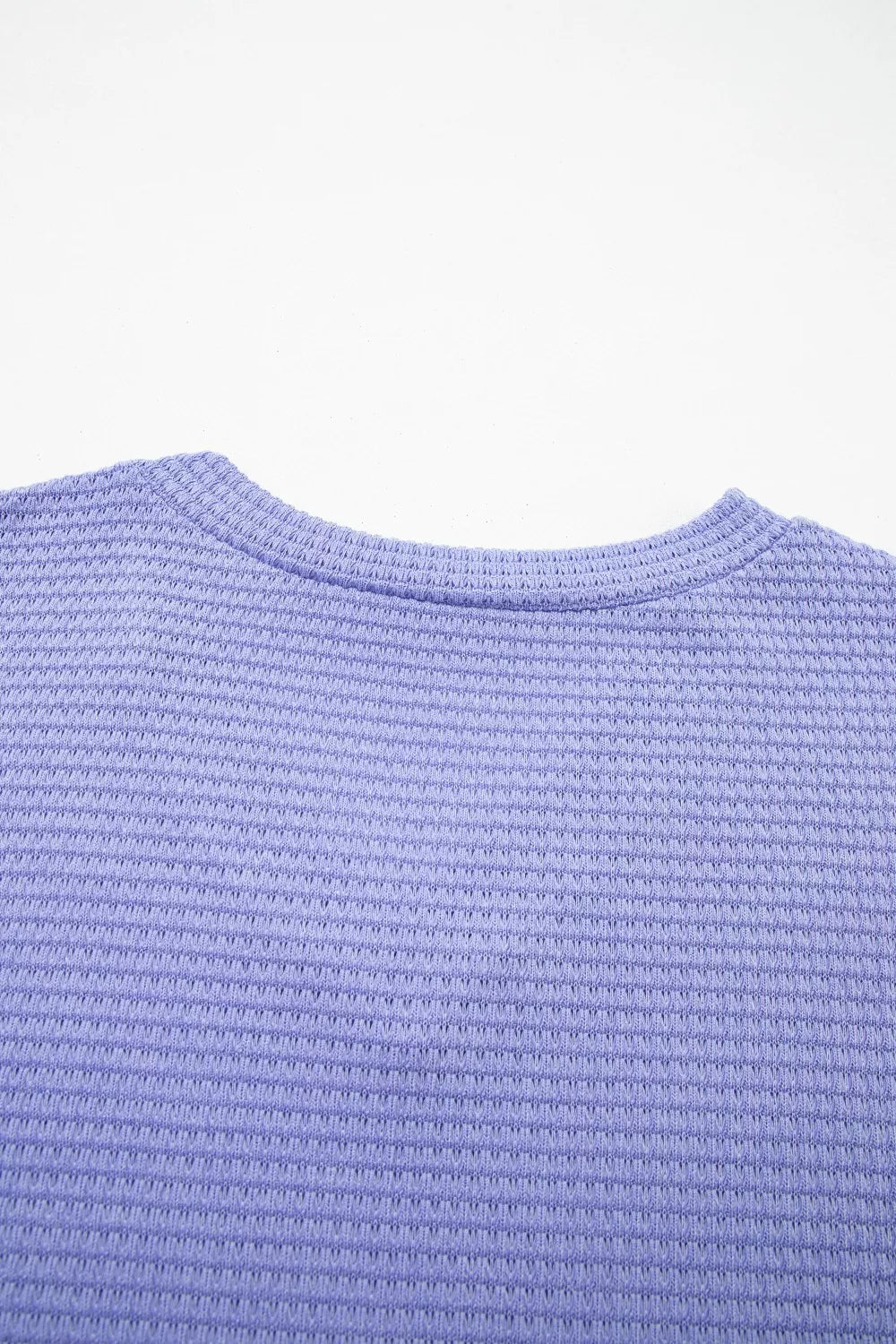 Plus size waffle knit V-neck top with cuffed short sleeves