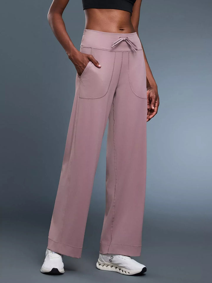 Wide-leg drawstring pants with curved front pockets