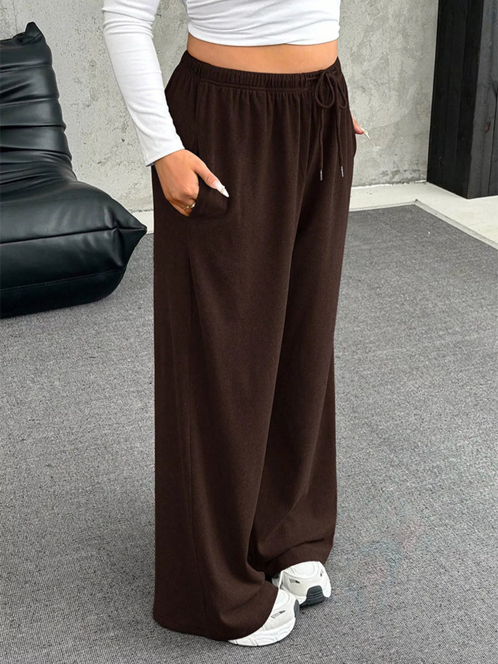 Wide-leg drawstring pants with elastic waist and pockets