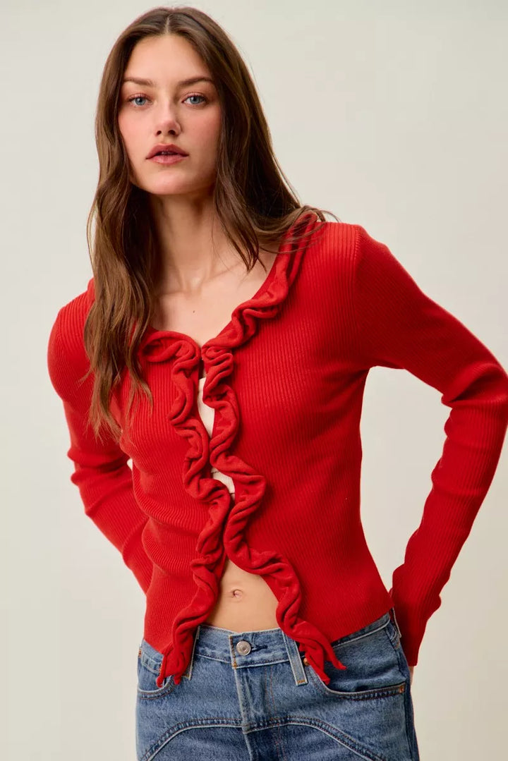Ribbed knit cardigan with cascade ruffle trim
