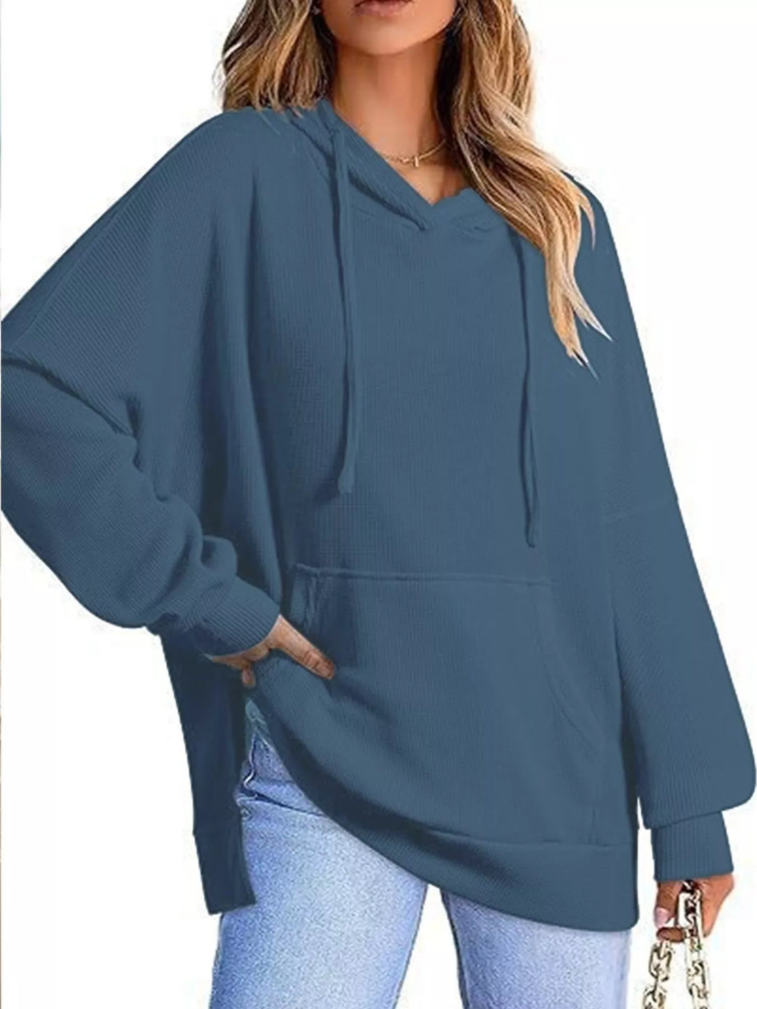 Oversized waffle-knit hoodie with side slits and front pocket