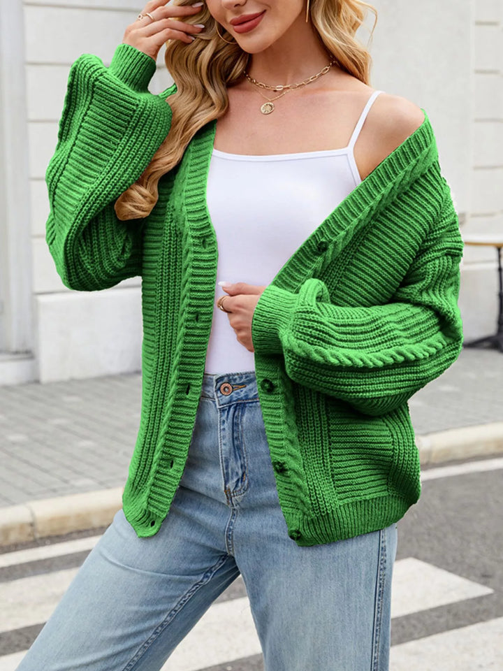 Cable knit button-front cardigan with drop shoulder sleeves