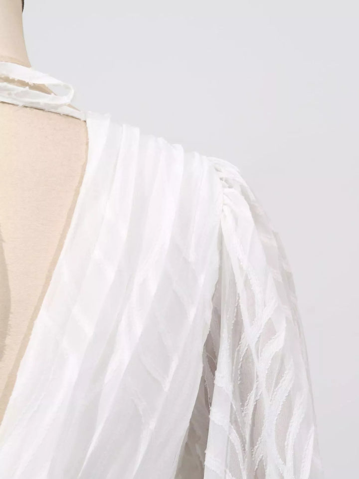 Textured V-neck balloon sleeve maxi dress with twist front