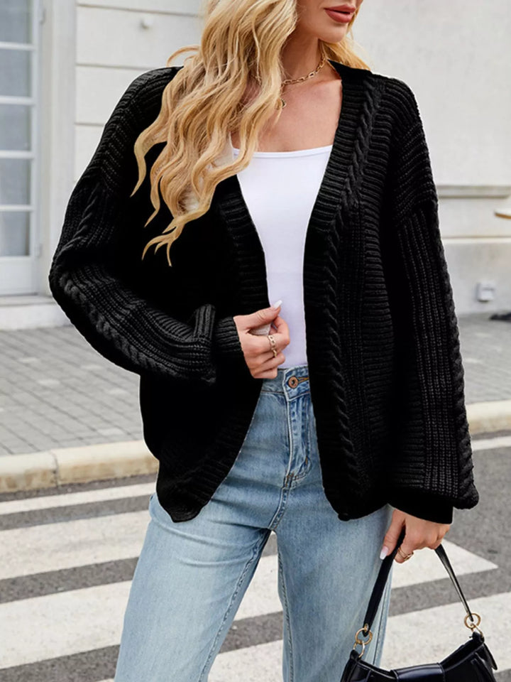 Cable knit button-front cardigan with drop shoulder sleeves