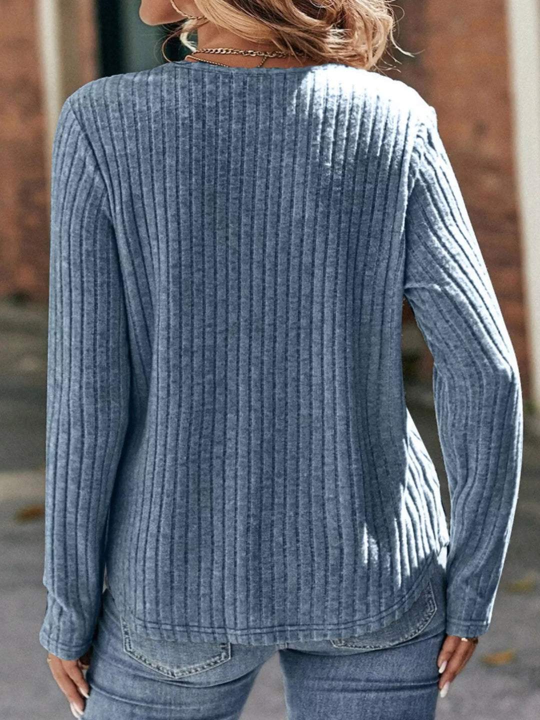 Ribbed knit top with lace shoulder panels and long sleeves