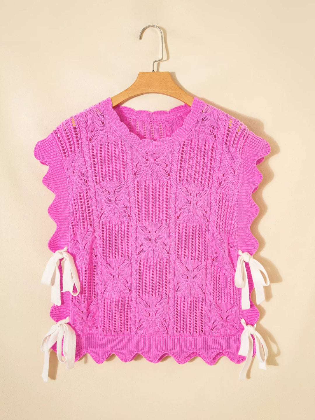 Openwork cable knit crop top with side ties and ruffle sleeves