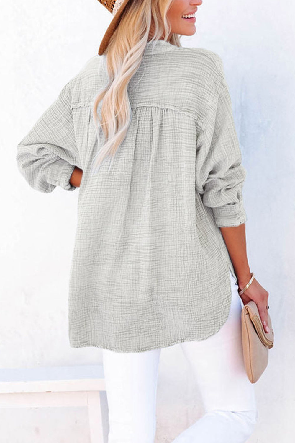 Textured cotton blouse with half-button placket and long sleeves