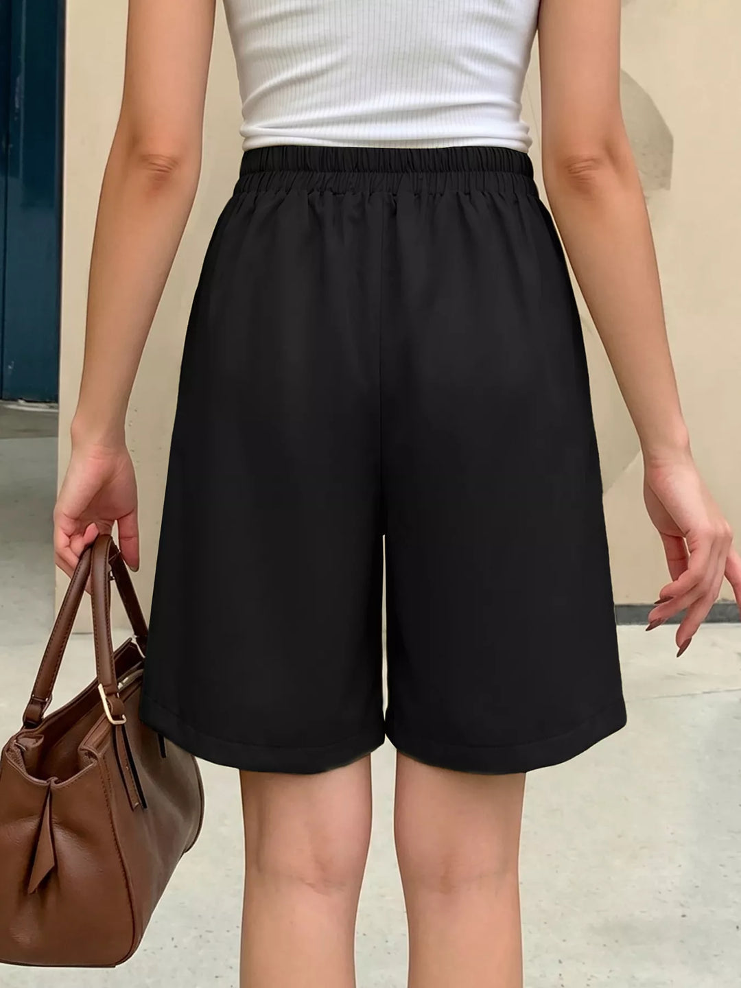 High-rise pleated wide-leg shorts with self-tie waist