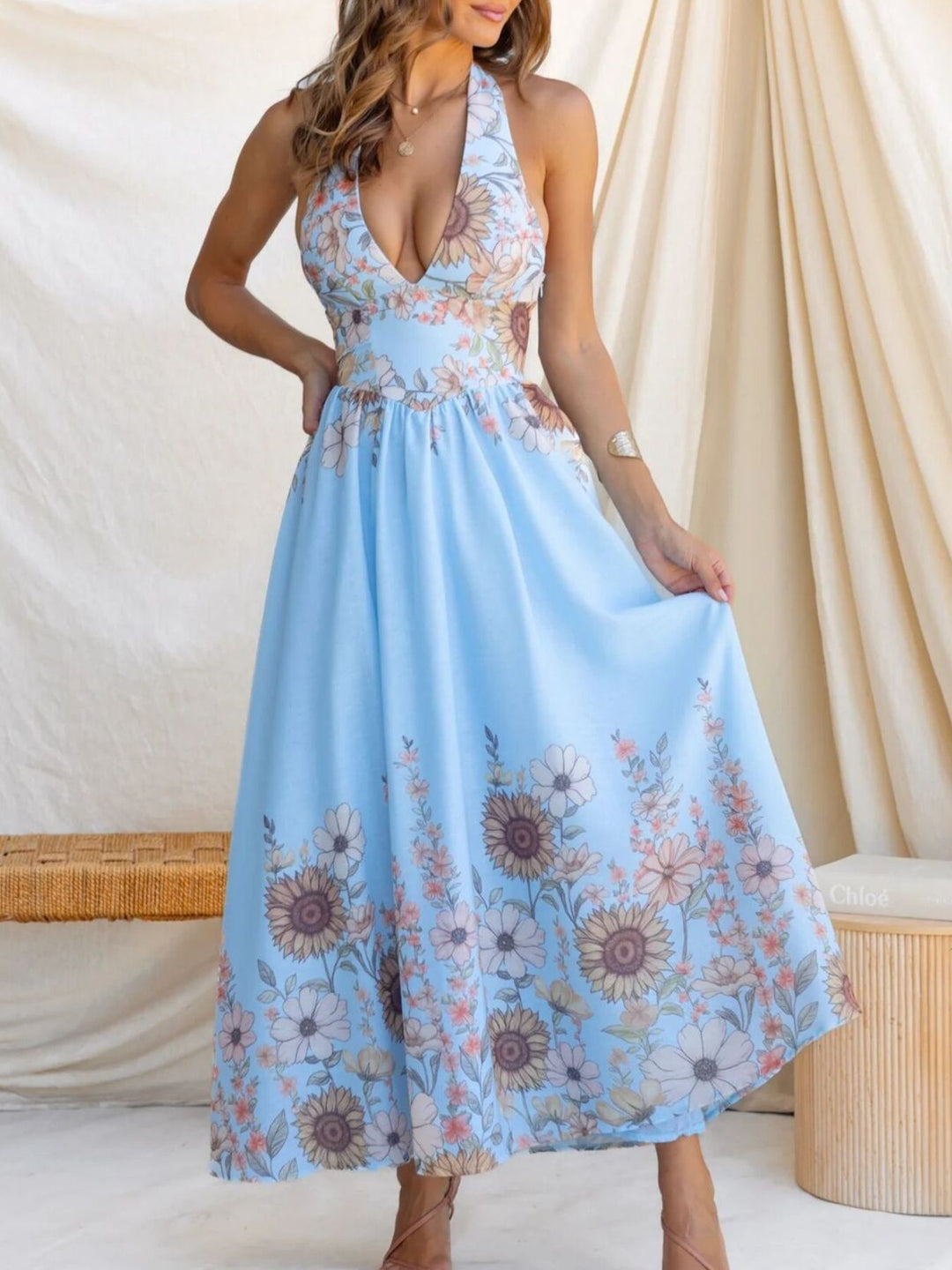 Sunflower print halter maxi dress with plunge neckline