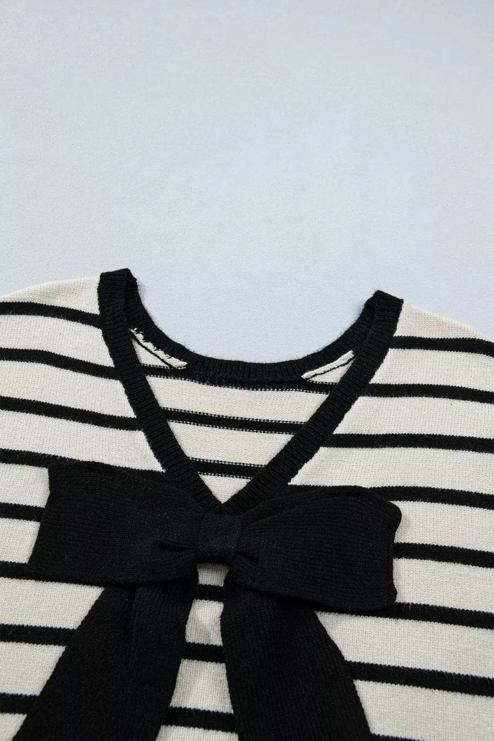 Striped short sleeve knit top with oversized bow
