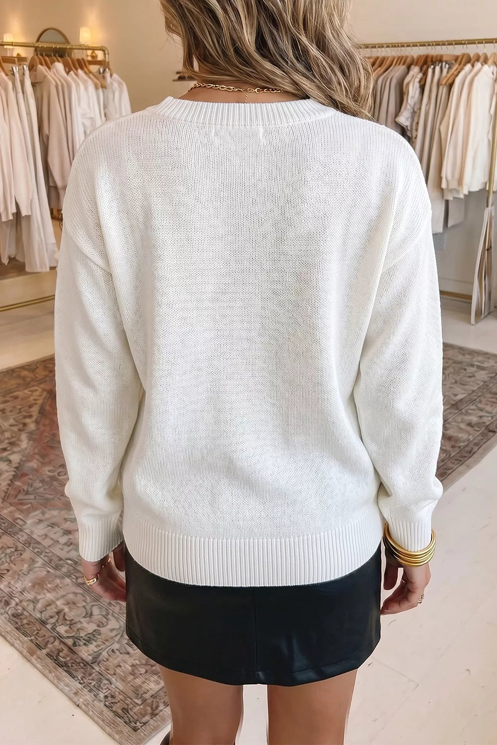 Drop shoulder crew neck sweater with knit bird graphic
