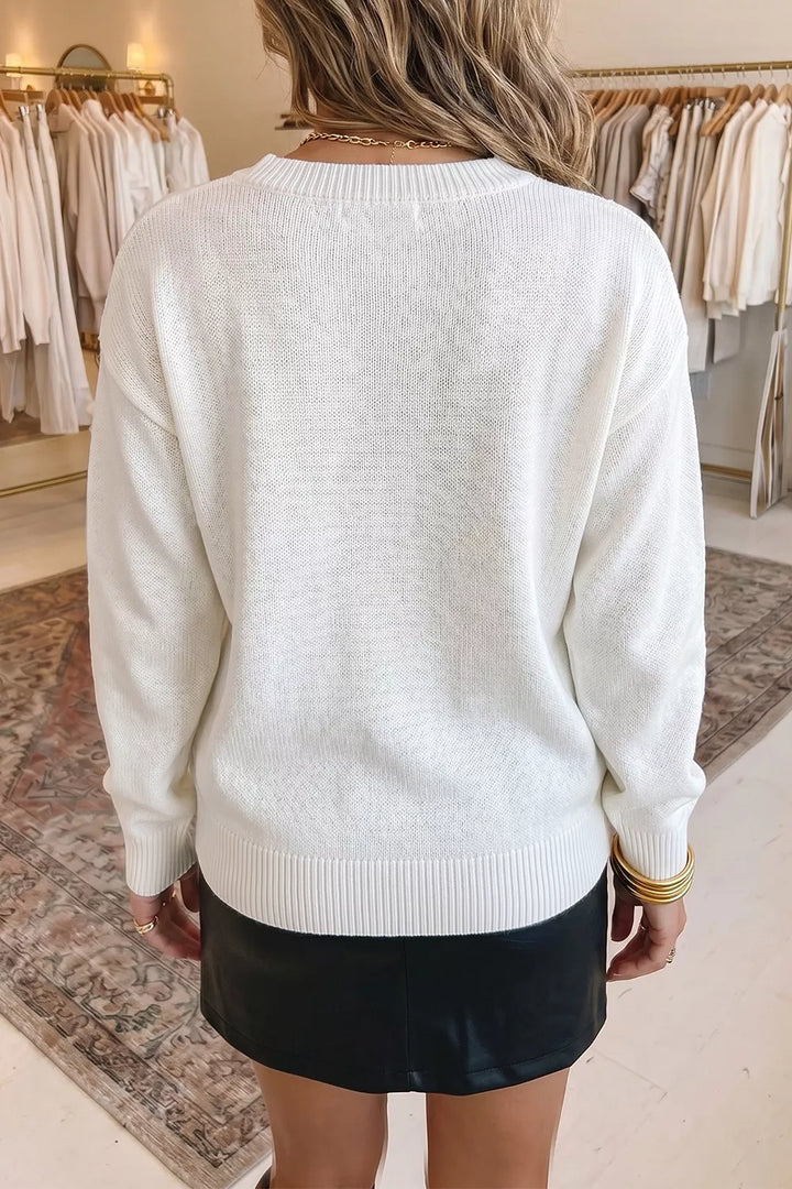 Drop shoulder crew neck sweater with knit bird graphic