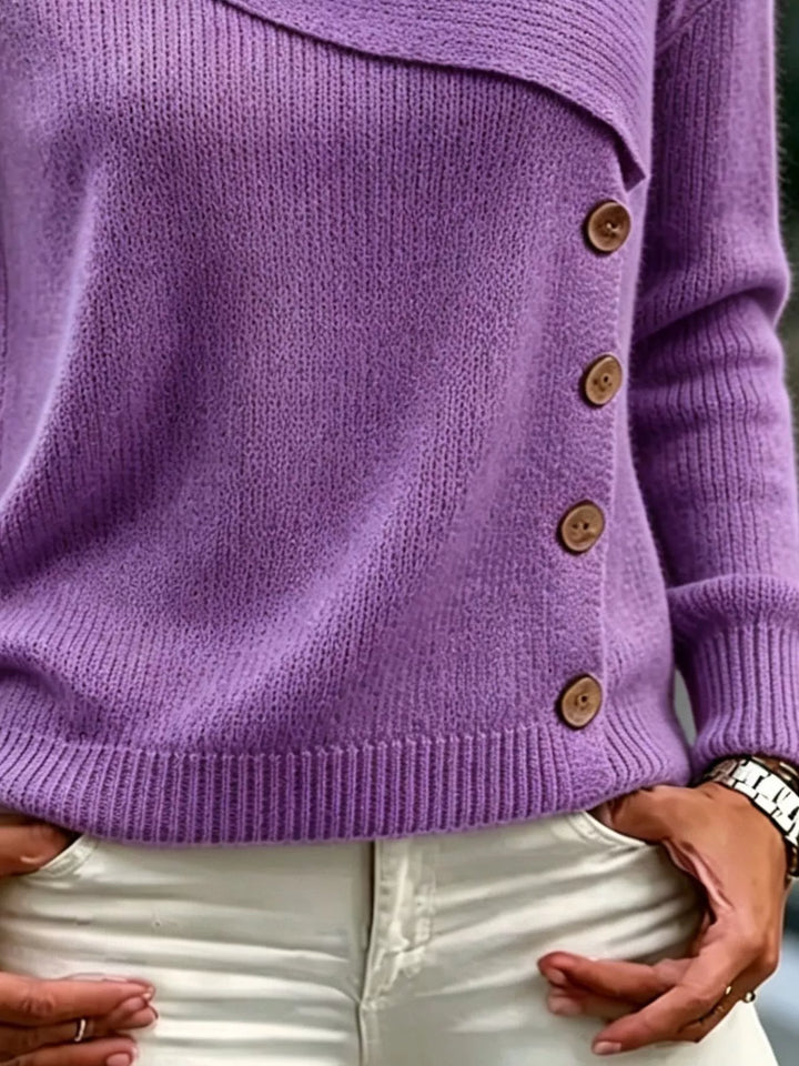 Asymmetrical button sweater with angled ribbed neckline