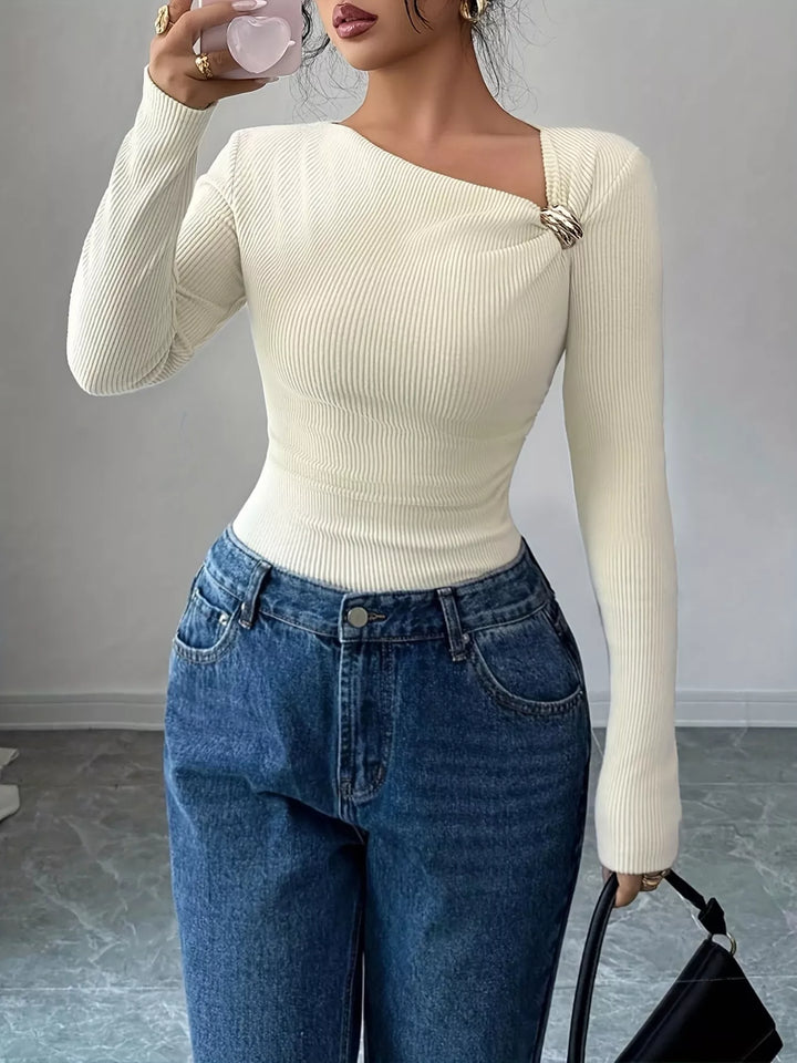 Ribbed knit asymmetric neckline top with gold buckle twist