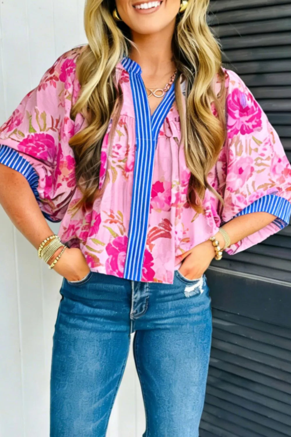 Fuchsia Pink Floral relaxed blouse with striped V-neck and cuff trim