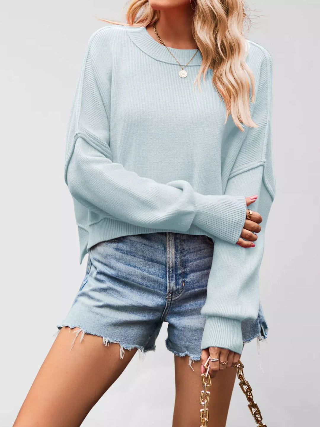 Light Blue Dropped shoulder crew neck sweater with ribbed raw hem