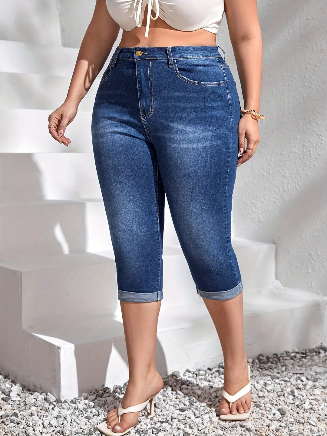 High-rise rolled hem capri jeans in plus size denim