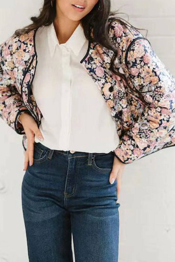 Quilted floral jacket with contrast piped trim and round neck