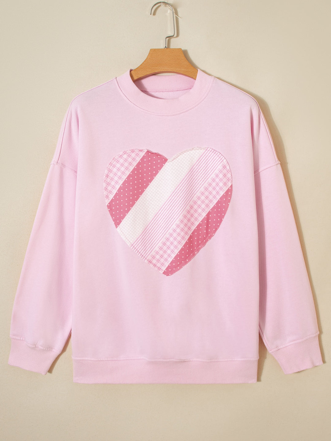 Patchwork heart oversized crewneck sweatshirt