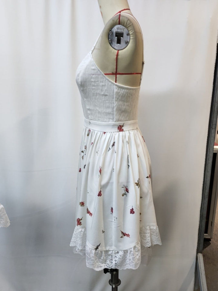 Floral cami dress with lace trim and asymmetrical hem