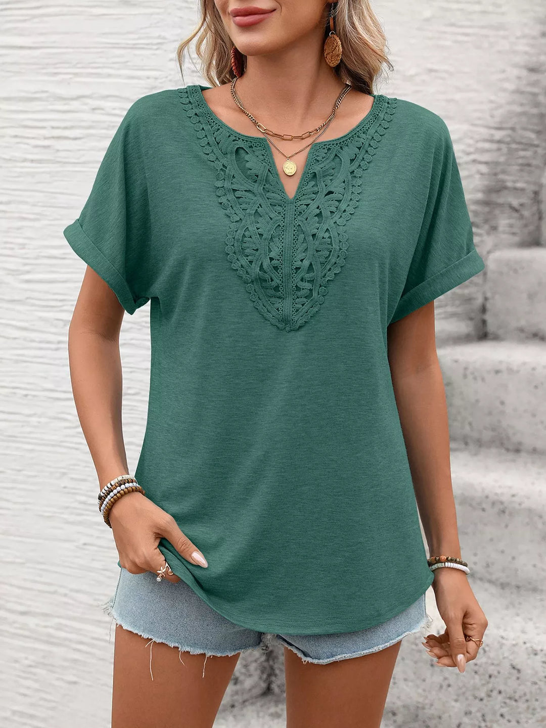 Lace-trim V-neck short sleeve top with rolled cuffs
