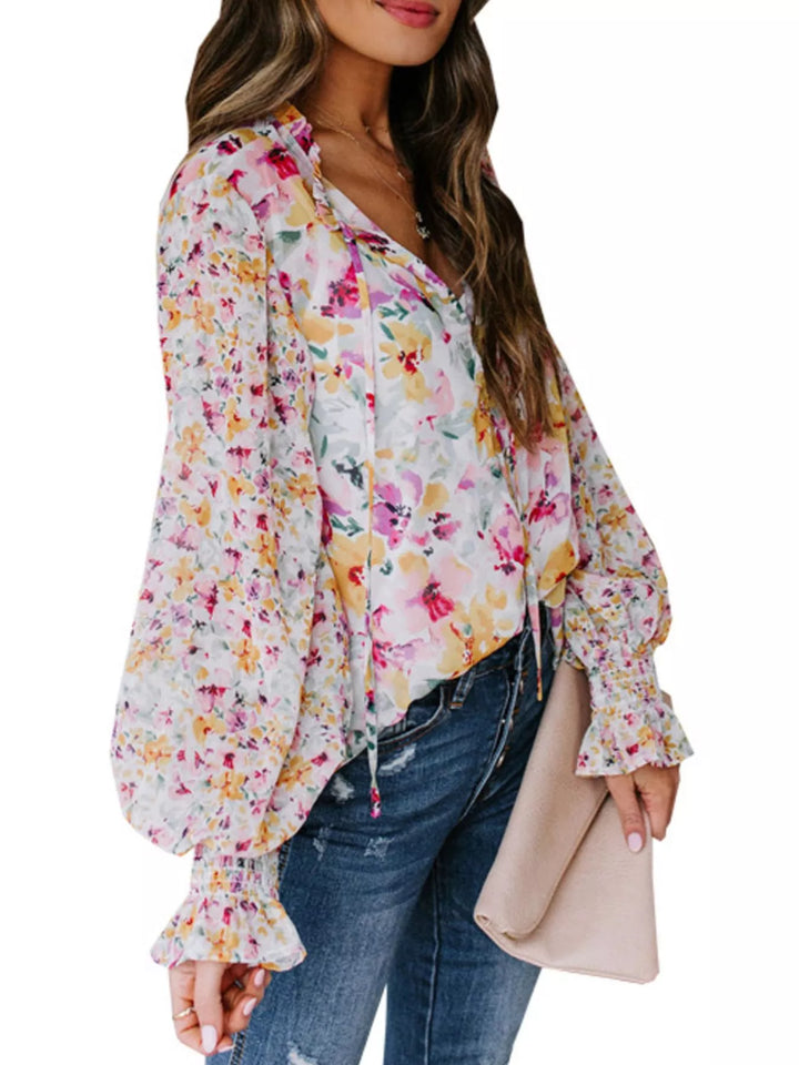 Floral print V-neck button-down blouse with smocked cuffs