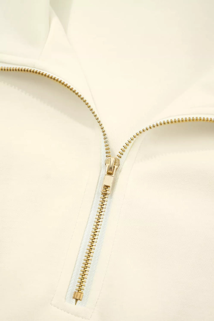Ruffle cap sleeve half-zip stand collar blouse