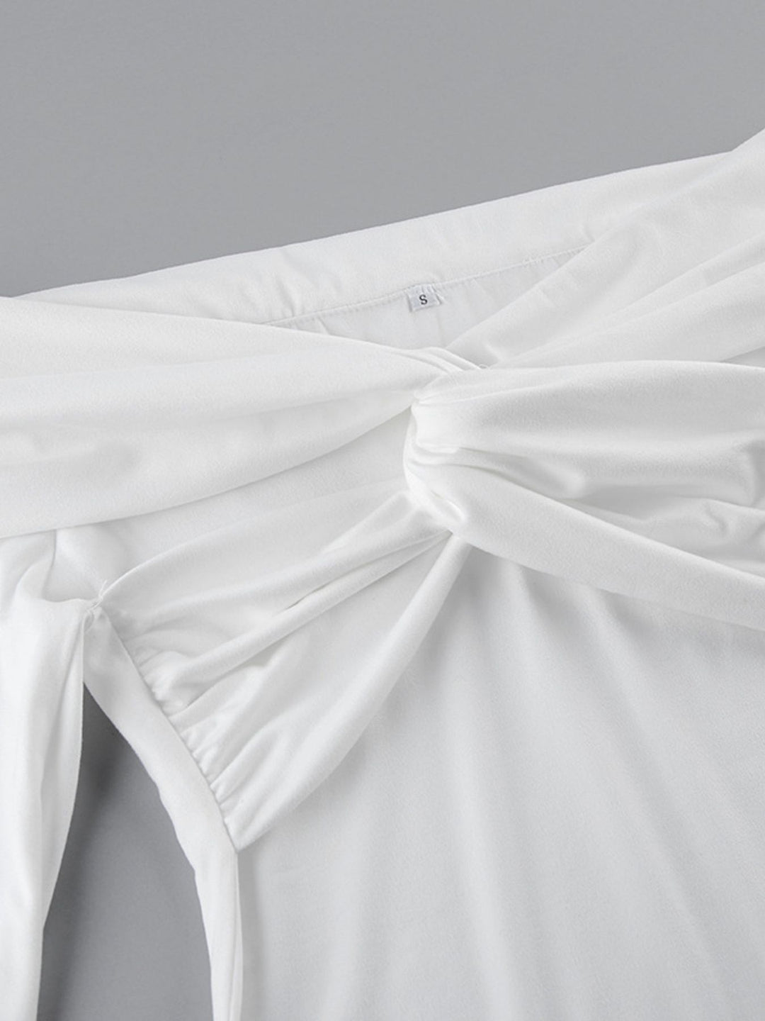 Twist-front off-shoulder fitted long sleeve top