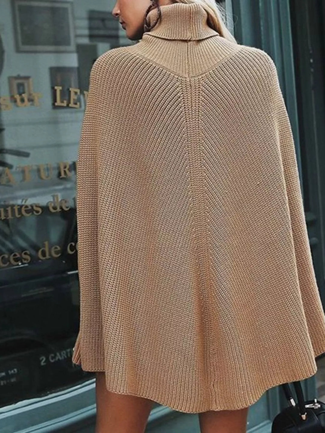Ribbed turtleneck cape sweater with side slits