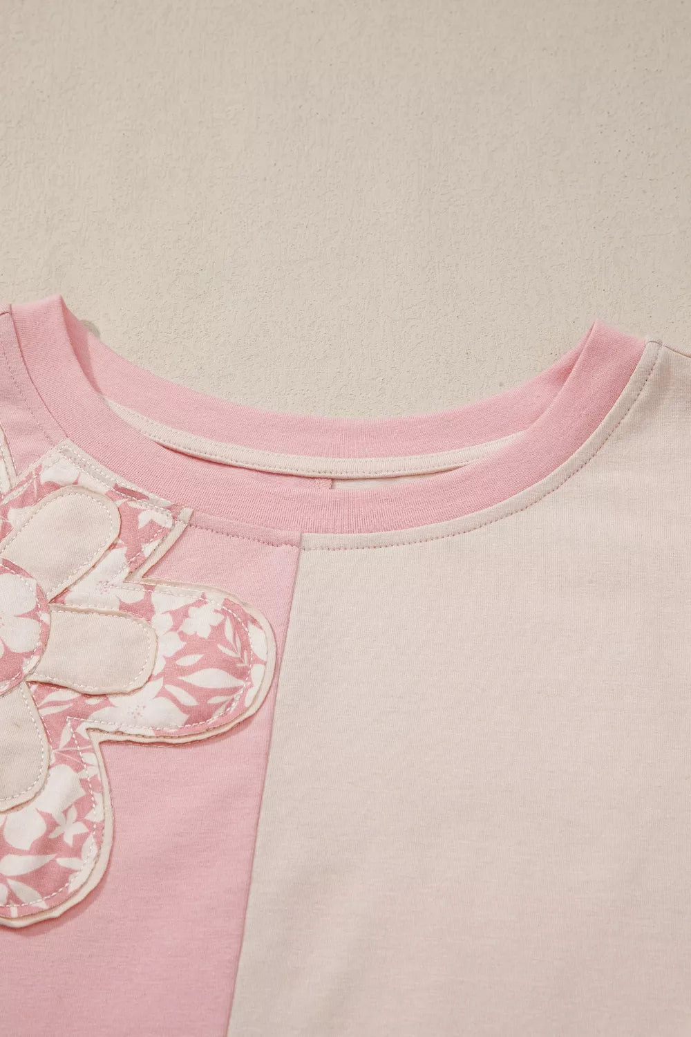 Color block tee with floral appliqué patches