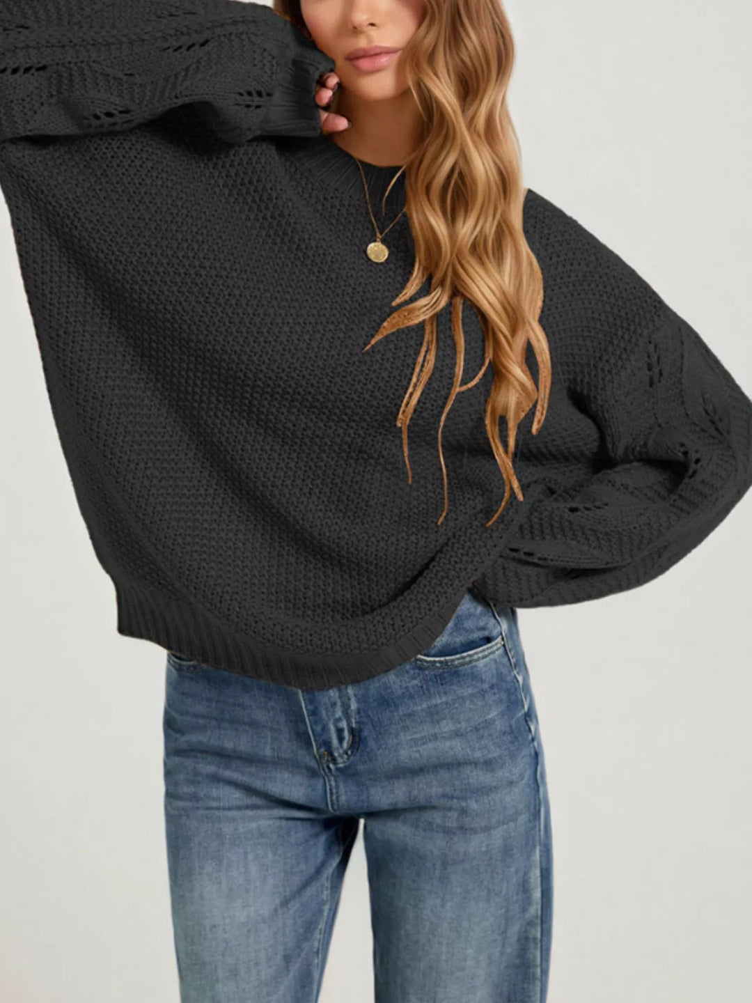 Openwork knit dropped shoulder sweater with curved hem