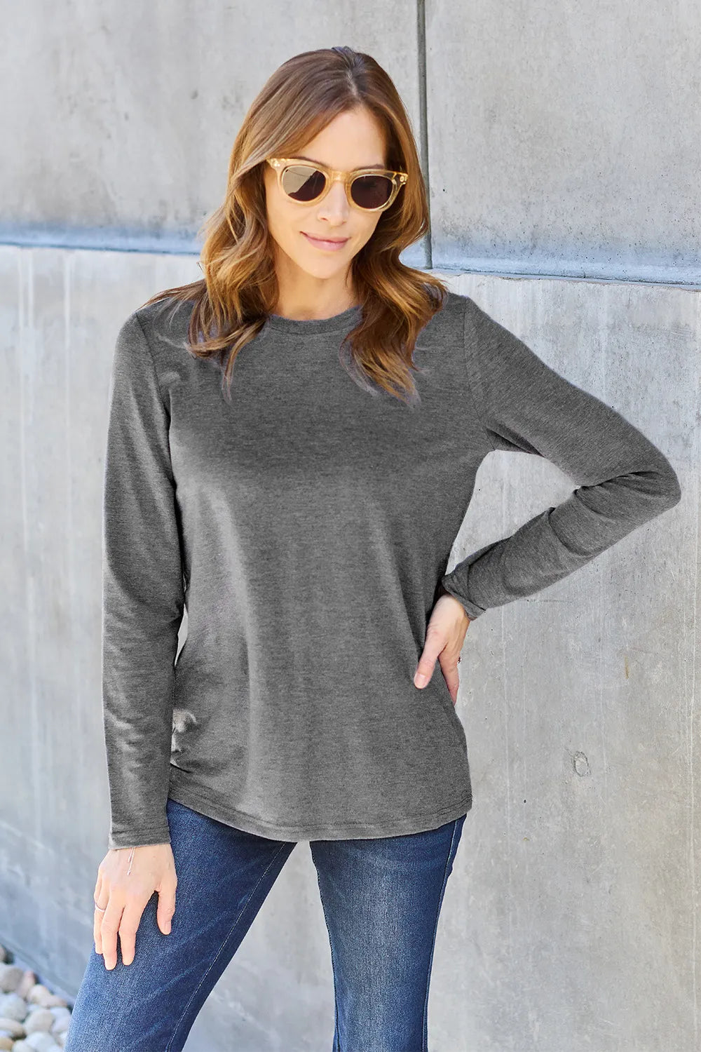 Crew neck long sleeve top with curved hem