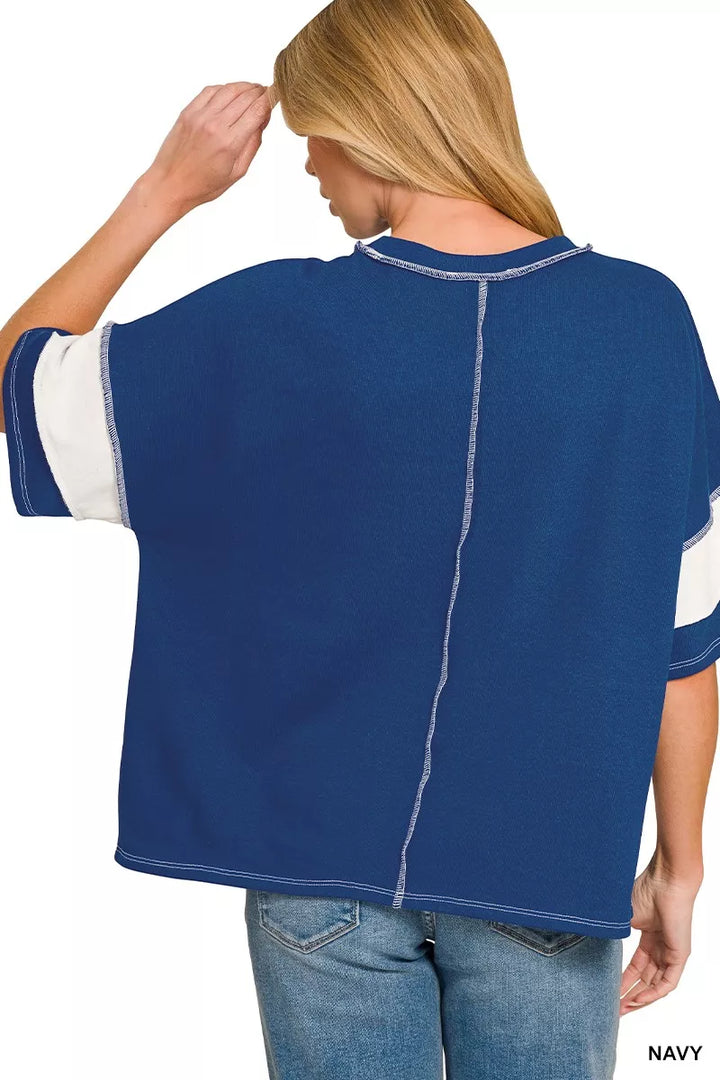 Wide-stripe French terry top with exposed seams and drop shoulders