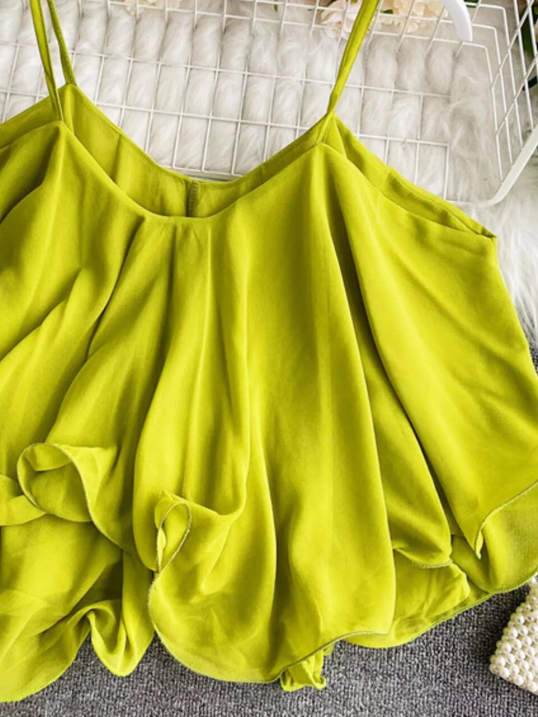 Flowy chiffon cami with ruffled hem and V-neck