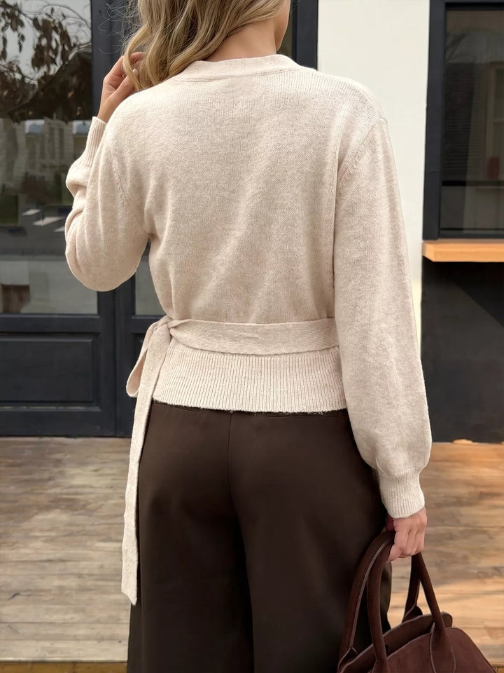 Surplice wrap sweater with side tie and drop shoulders
