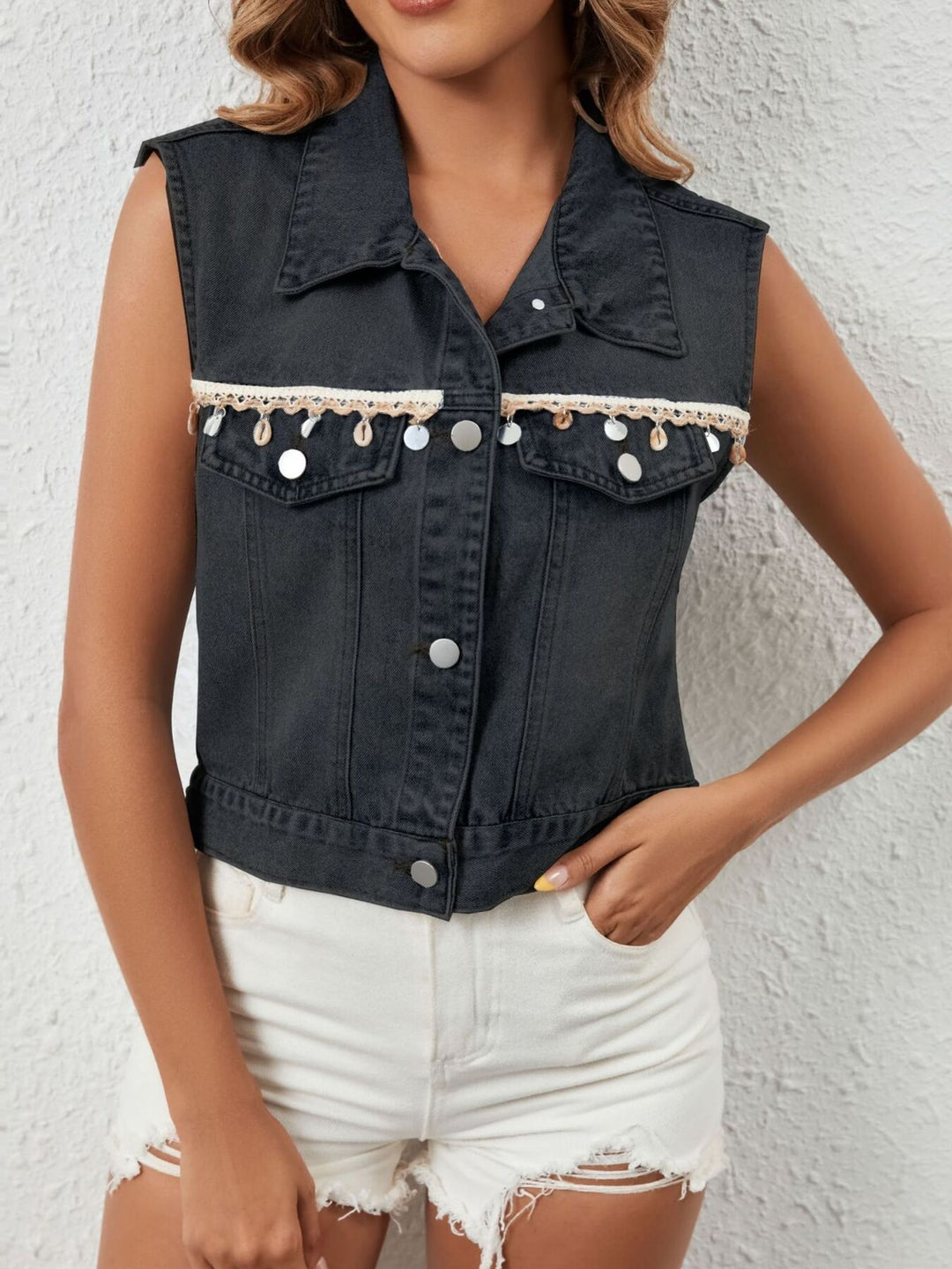 Sleeveless denim vest with shell and coin trim