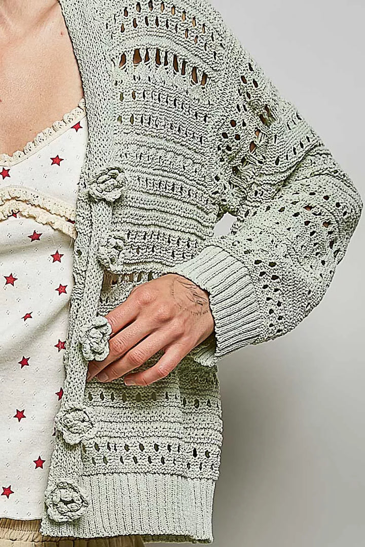 Open-knit V-neck cardigan with 3D floral buttons