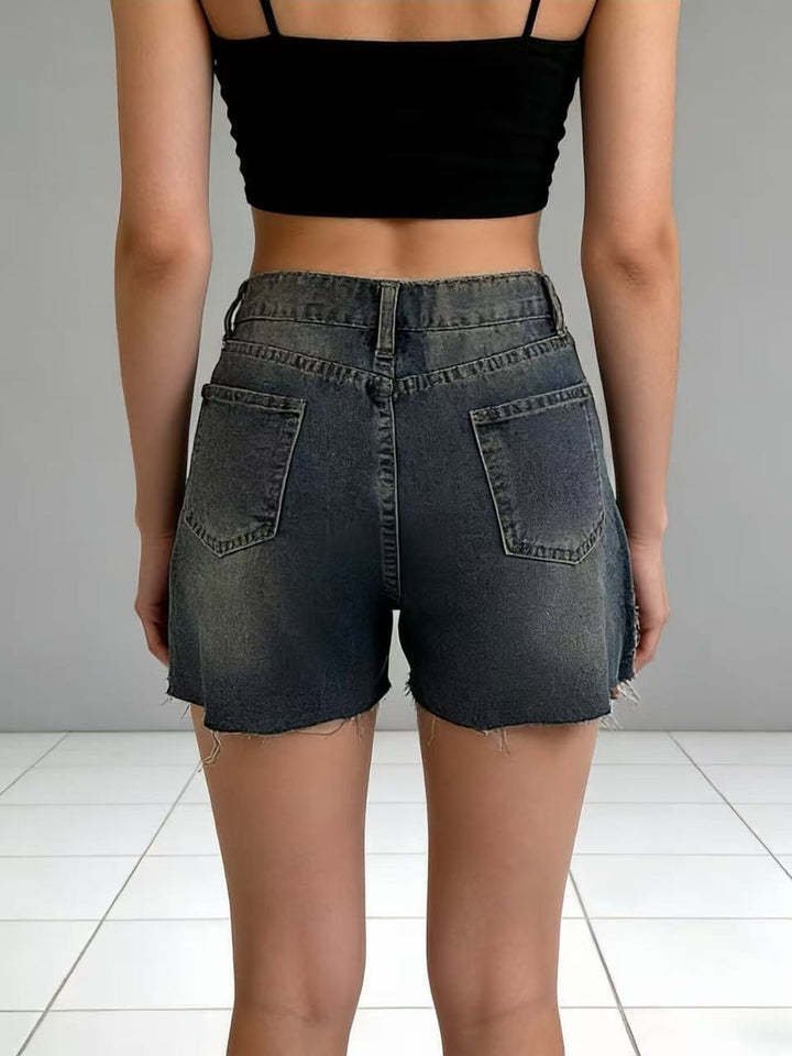 Distressed high-rise denim shorts with frayed raw hem
